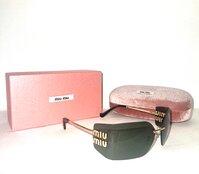 Солнце - miu miu SMU54YS 5AK-30B 110 3N